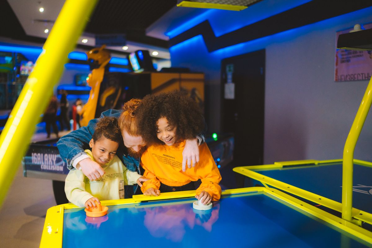 Família no arcade